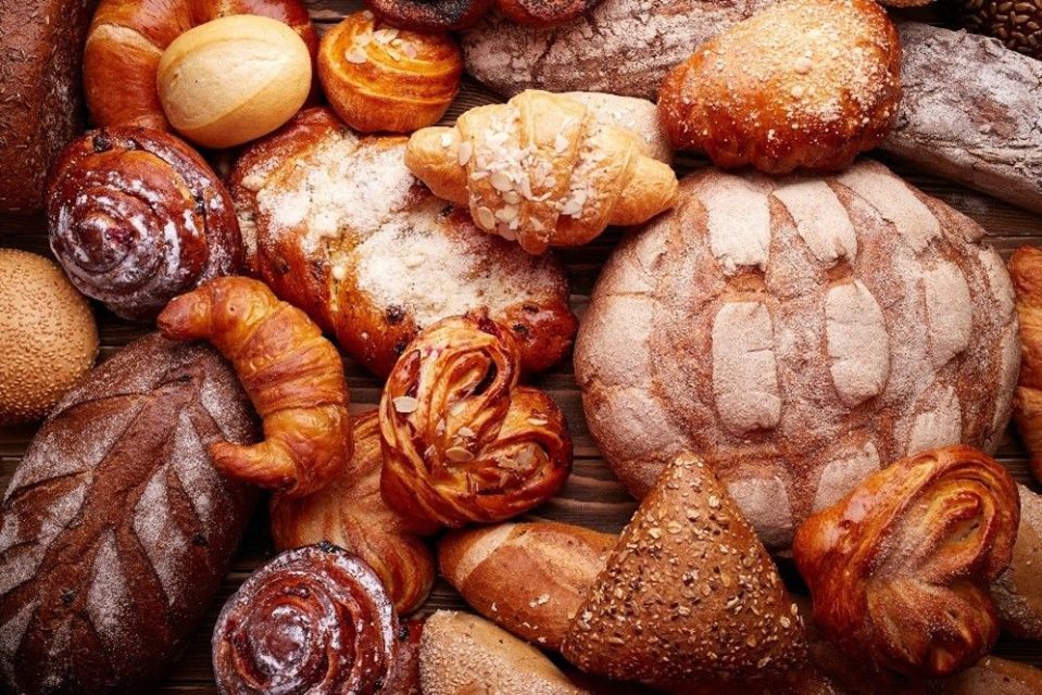 A close up of various breads and pastries